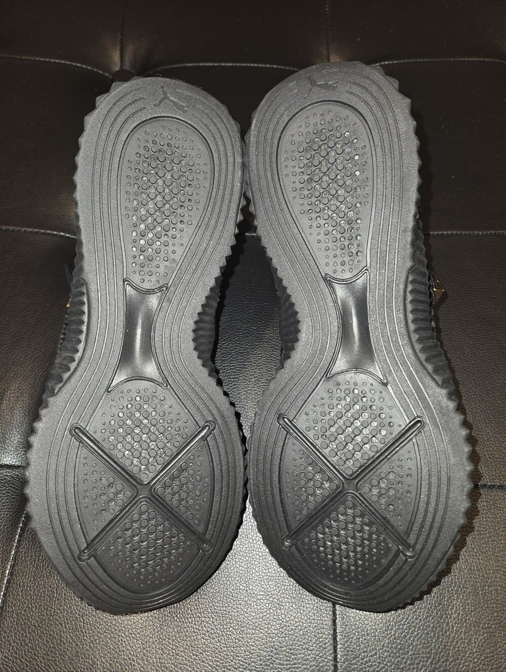 Puma Black Knit Slip-On Trainers with Gold Accents - Picture 5 of 7